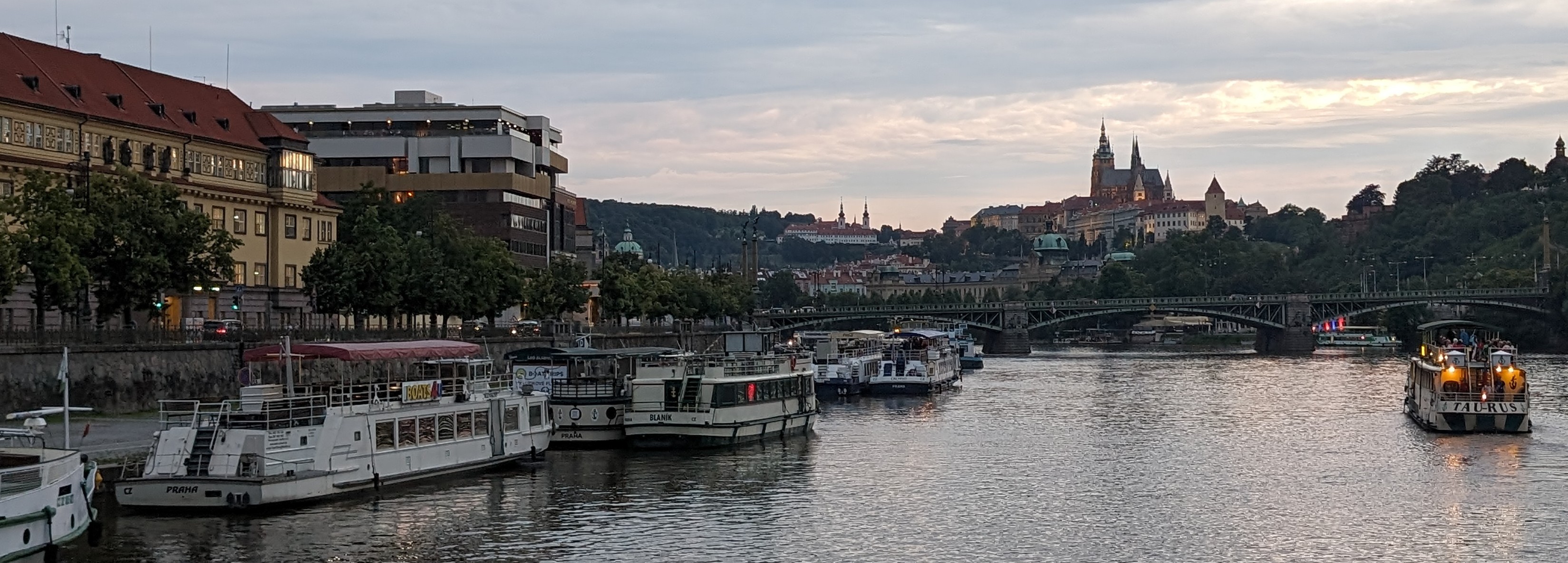 The Vltava river and Prague Castle at dusk